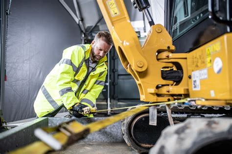 tie down a mini excavator|how to tie down an excavator.